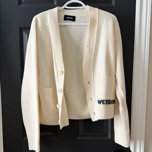 Cream Cardigan with Black Logo